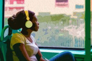 young-black-woman-listening-music-travelling-by-bus-looking-outdoor-the-window-pensive-SBI-304225166.jpg